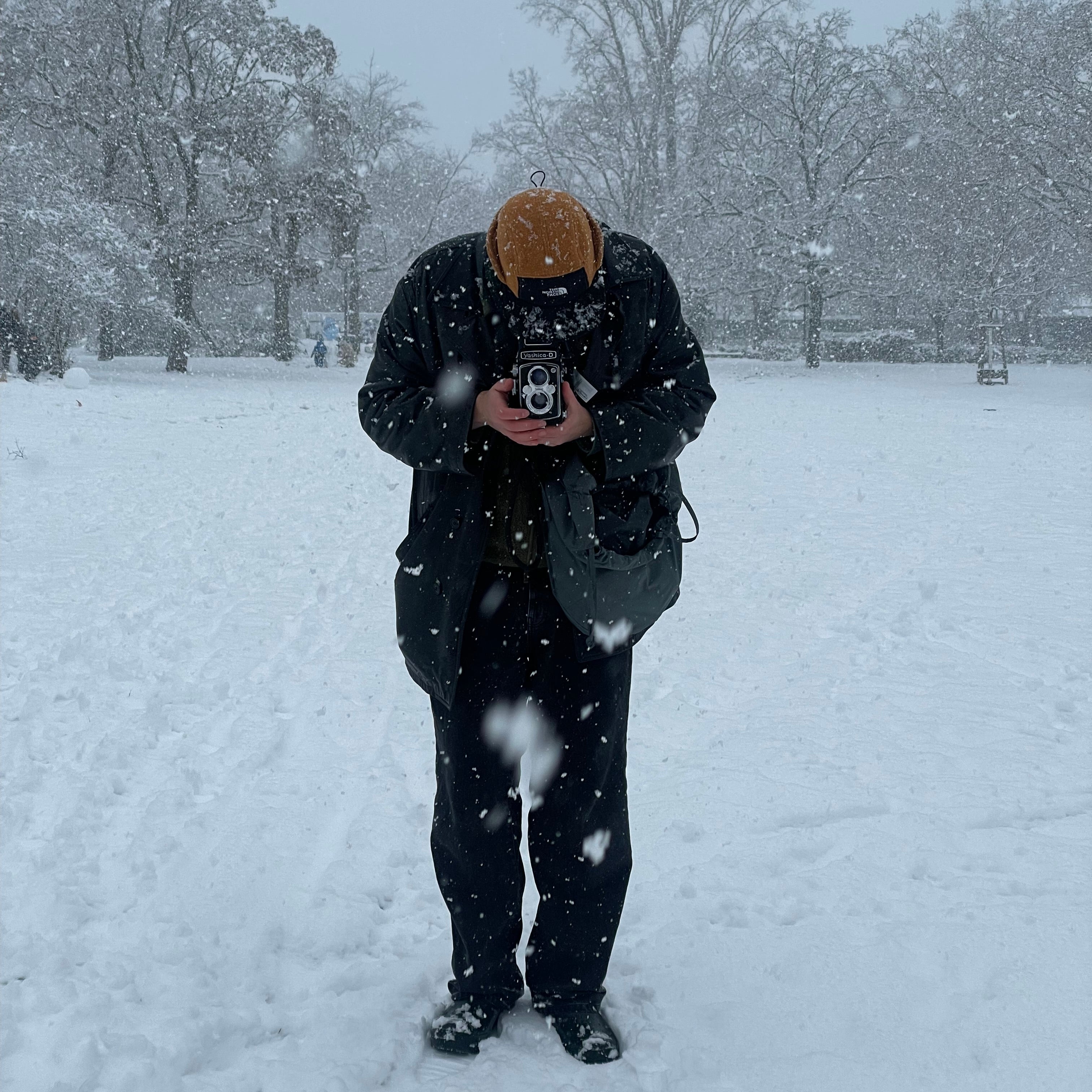 Joe in the snow with a medium format camera