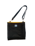 Boop Boop Berlin black water-repellent dog travel bag prototype, one-size portable pet travel bag, folded outer view