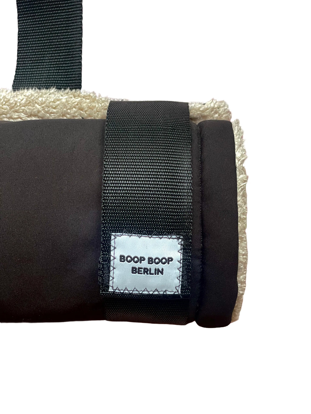 Boop Boop Berlin black water-repellent soft shell dog travel mat, one-size portable pet settle mat, front detail view