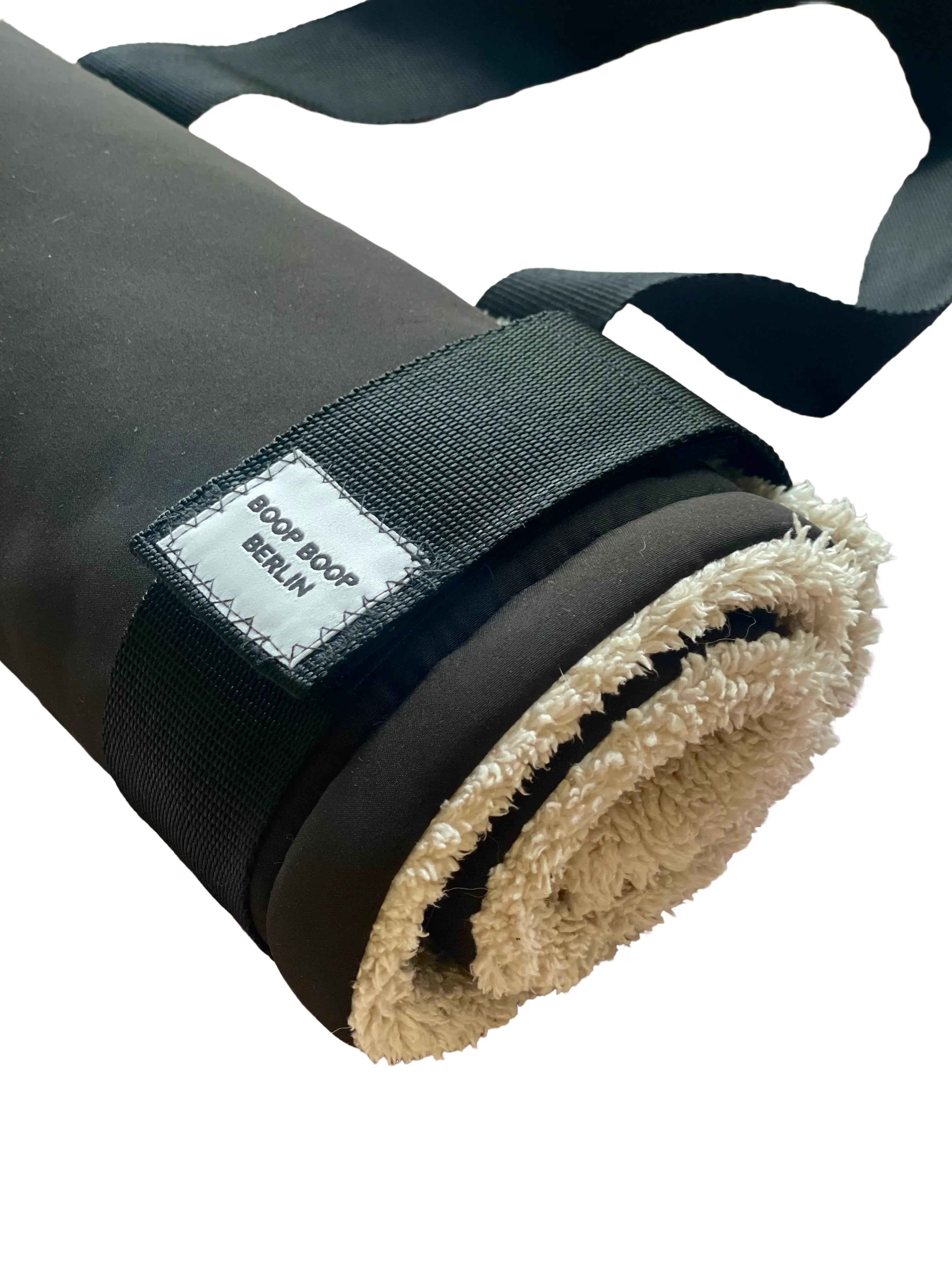 Boop Boop Berlin black water-repellent soft shell dog travel mat, one-size portable pet settle mat, roll-up side view